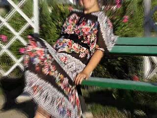 hairy mature woman flashing in the park under skirt.