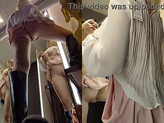 upskirt peek at blonde's pussy in public fitting room