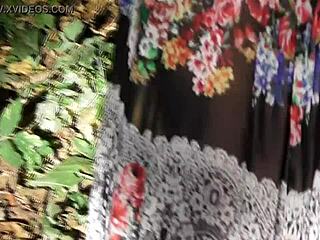 hairy mature woman flashing in the park under skirt.