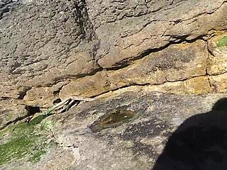 African Woman Relaxes On Nudist Beach