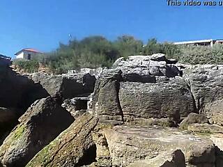 African Woman Relaxes On Nudist Beach