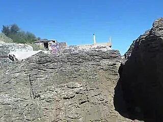 African Woman Relaxes On Nudist Beach