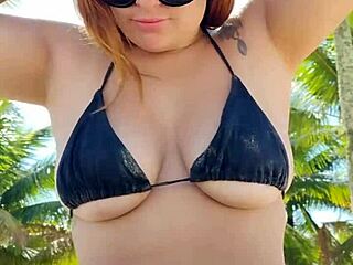 African Woman Flashes In Short Bikini At Beach