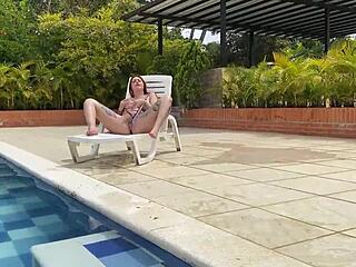 does naughty redhead andy rose taste and ride big cock in pool?