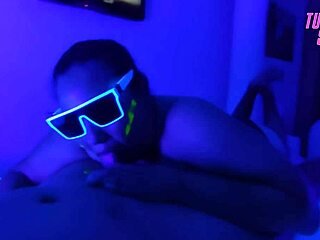 Submissive Stepdaughter Performs Deepthroat Blowjob in Neon Room