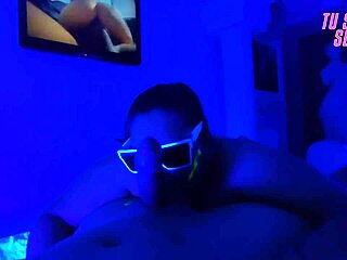 Submissive Stepdaughter Performs Deepthroat Blowjob in Neon Room
