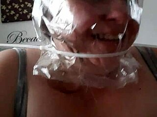 Bound in bondage, head positioned for intense play