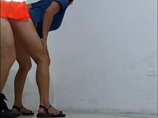 Cleaner Seduces Nurse in Office Hallway