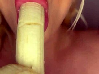 horny coed sucks banana teasingly