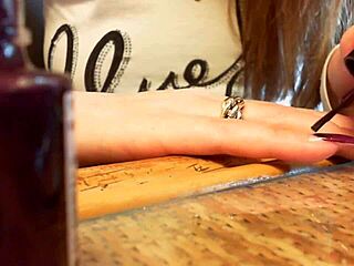 Italian babe relaxes with long nails in sexy ASMR video.