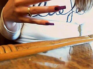 Italian babe relaxes with long nails in sexy ASMR video.