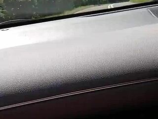 Housewife rides down the road flashing her tits in public