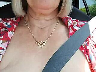 Housewife rides down the road flashing her tits in public