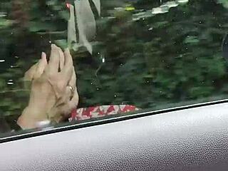 Housewife rides down the road flashing her tits in public