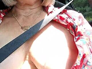 Housewife rides down the road flashing her tits in public
