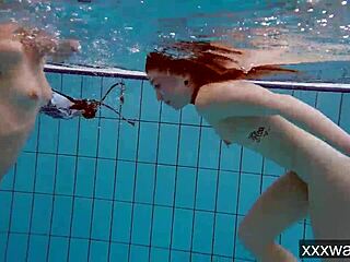 Beautiful russian girls enjoy swimming in the pool wearing bikinis