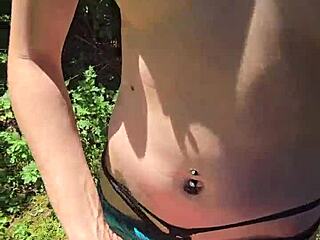 wife in skirt gives quick handjob outdoors while husband watches the public milf scene