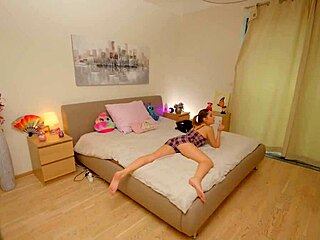 teen solo masturbates with glass dildo on shaved pussy