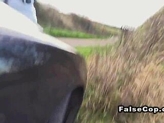 Hey, check out this tattooed babe fucking in the police car right in public!