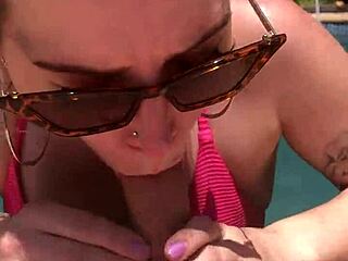 Katarinakitty deep throats cock by the pool and teases with natural tits.