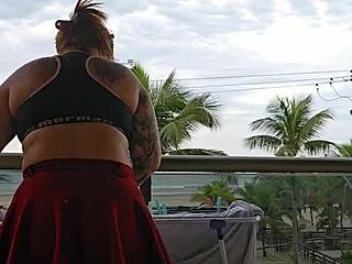 Feeling excited while flashing my ass in a skirt on the balcony