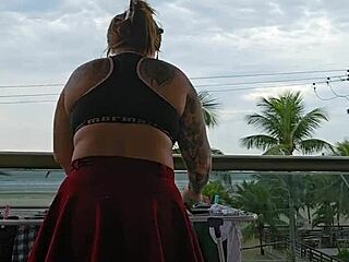 Feeling excited while flashing my ass in a skirt on the balcony