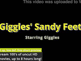 my giggles feet getting sandy at the beach behind the scenes with tattoos and long hair