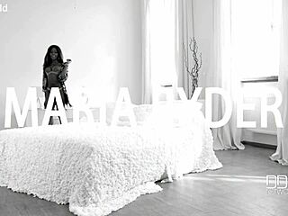 black beauty with long hair masturbates deeply using pink toy