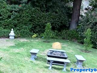 asian realtor interacts with client outdoors