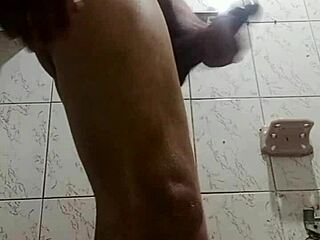 Detailed male masturbation session in private.