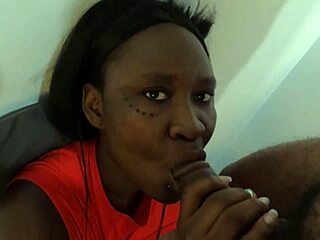 This ebony bitch sucks big black cock poorly