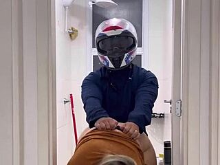 Motoboy enters women's bathroom and assists woman in private moment