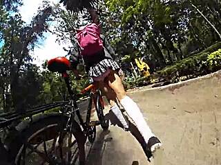 Exhibiting in miniskirt in the city.