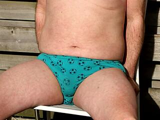 Pissing in my undies and drying up in the sun with small cock exposed.