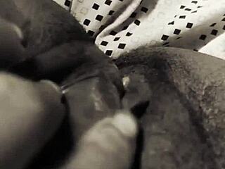 The HORNY stepmom RUBS her WET pussy. She feels intense arousal building up.