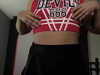 why is the cheerleader showing her huge ass to the camera?