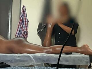 Asian big ass flashing to Thai massage girl - will she notice or join the fun?