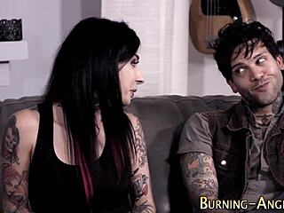 Tattooed goth hints at wild ride on hard cock