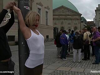 Blonde European slut bound and gangbanged hard in public outdoor BDSM session with flashing and pain.