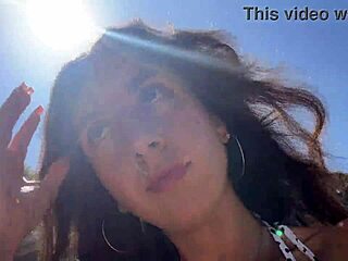 I stroll with sticky mess on my face across a crowded public beach