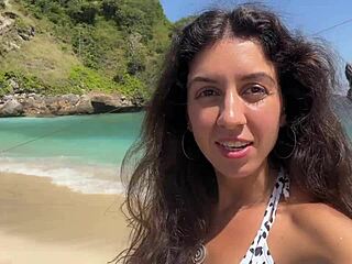 I stroll with sticky mess on my face across a crowded public beach