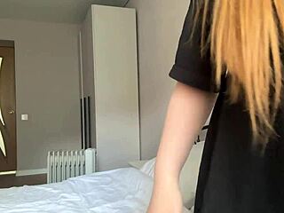 This cutie in a black t-shirt is fingering her pussy until she cums hard.