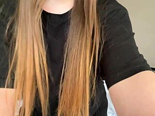 This cutie in a black t-shirt is fingering her pussy until she cums hard.