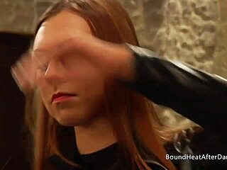 Two hot lesbian slaves kiss together. Madame touches them in bondage domination with fingering and pussy licking.