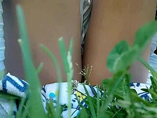 this whore just starts pissing and burping out in the public park with no underwear on