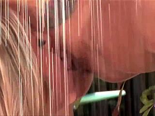 Two divine blondes kiss in the garden while fingering each other's small tits and wet cunts. Orgasm builds outdoors.