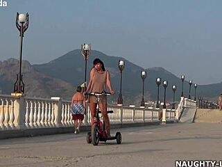 Milf wife flashes nude body during outdoor naked ride in public