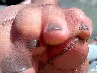 Goddess In Tan Nylons Shows Her Cute Nylon Soles And Toes On The Riverside