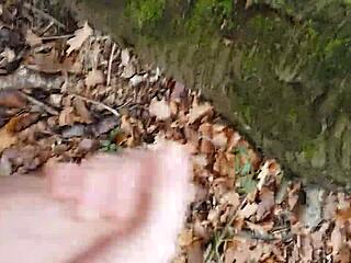 Forest masturbation session happens outdoors in nature with solo focus.