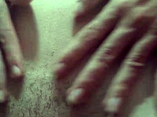 Essa puta novinha shows small tits and wet hairy pussy without panties on street